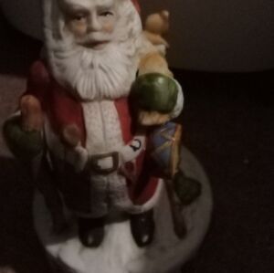 Vintage Santa music box need from fixing but great decor
